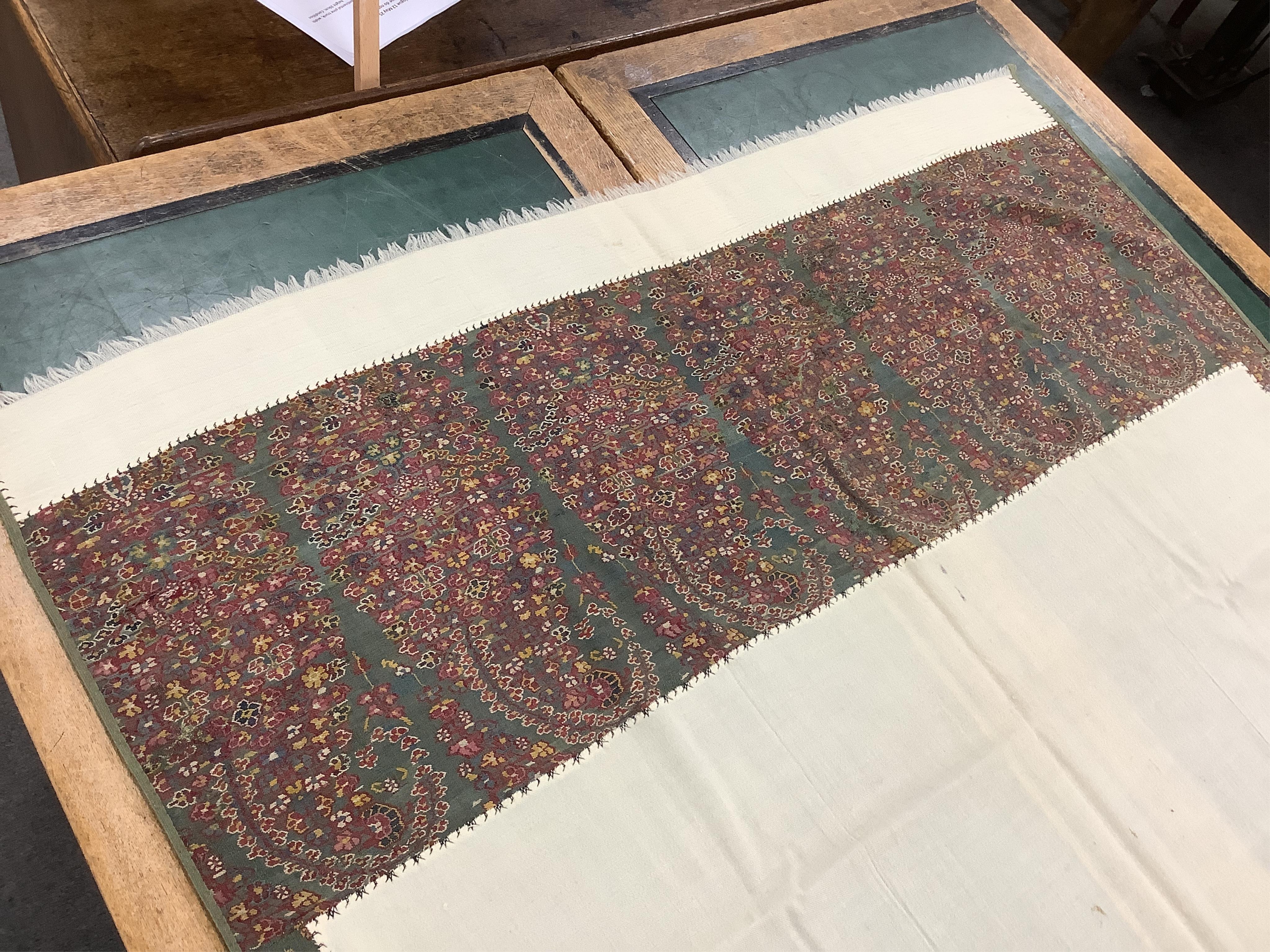 A cream pashmina shawl with woven Paisley ends, 223x104cm